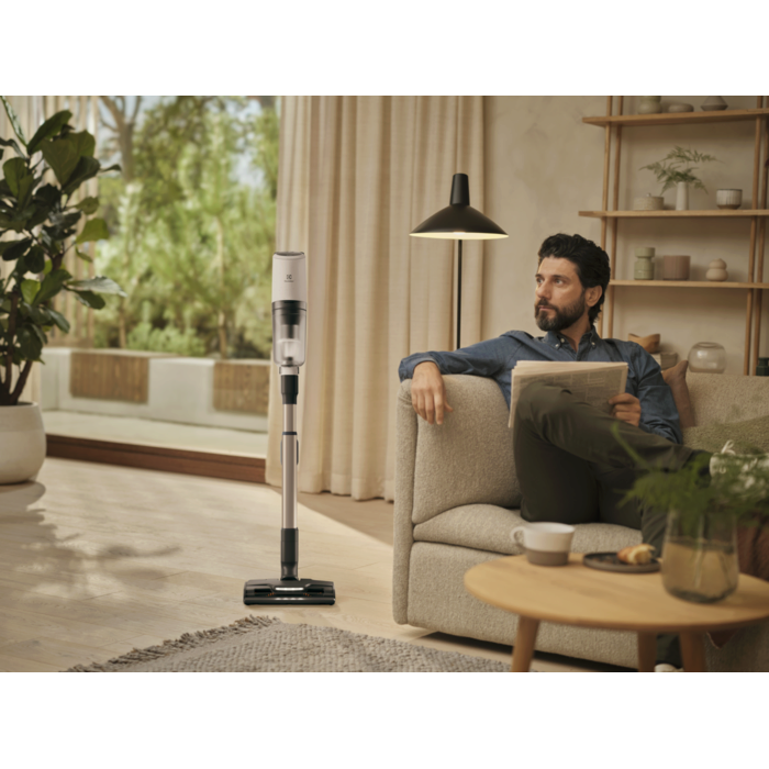 Vacuum cleaner in use in a home environment