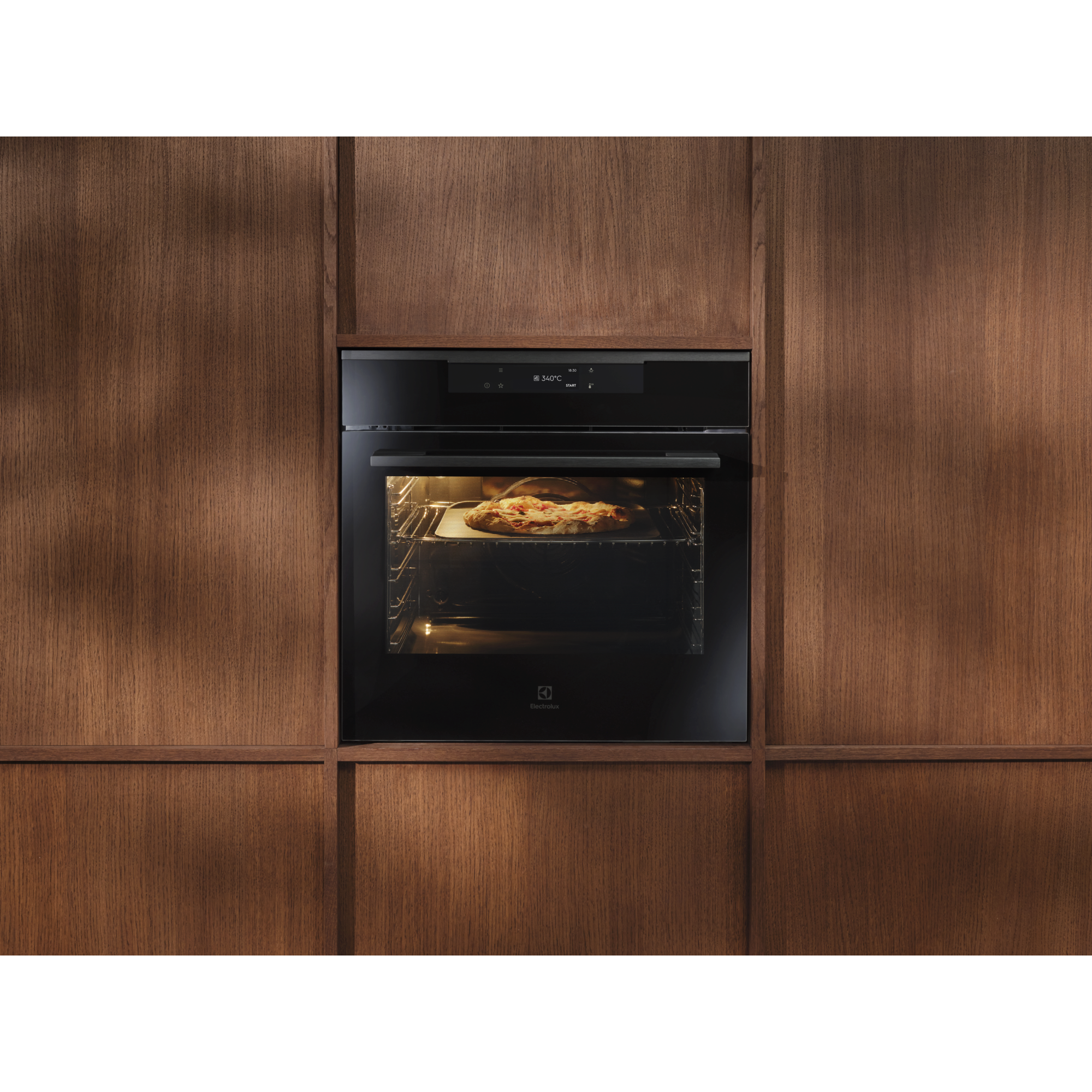 Electrolux Pizza Expert ER oven with a pizza inside 