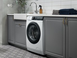 Integrert vaskemaskin fra Electrolux i et fint rom