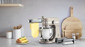 Kitchen machine making pasta sheets with attachment